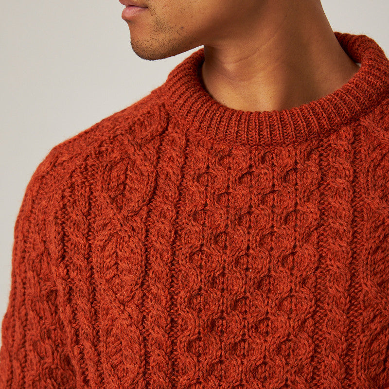 Product image for Herring Hudson Aran Jumper by Peregrine in orange